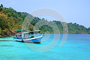 Motor-boat and island photo