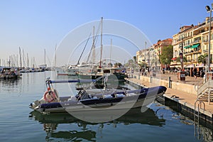 Motor boat moored in the port of Cannes