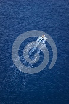 Motor boat sailing by the sea or ocean.