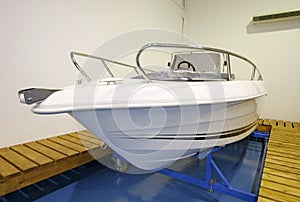 Motor boat in showroom or garage