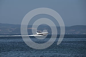 Motor boat speed in sea. Powerboats on sunny seascape. Travel on boat and water transport. Summer vacation on tropical