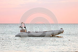 Motor boat on the water surface of the sea