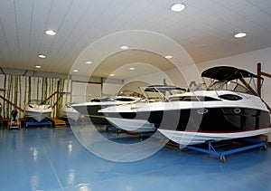 Motor boats in hangar photo