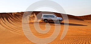 Motor car in desert