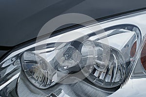 Motor car headlamps