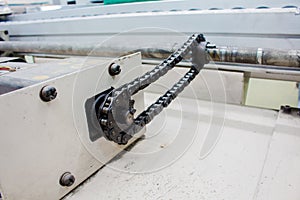 Motor chain drive shaft in conveyor line