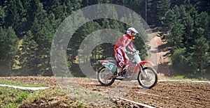 Motor cross rider on track
