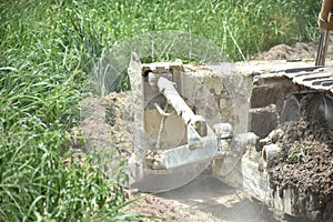 Motor grader machine civil constructionstripping to weed debris in site work. Tractor working in a field for prepared to