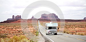 Motor home RV leaving Monument Valley, Utah.