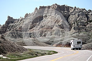 Motor home RV traveling through the Badlands National Park, South Dakota. photo