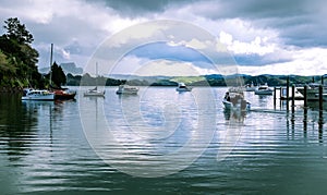 Motor launch motoring out of Whangaroa Harbour marina, Far North photo