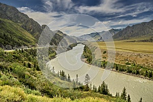 motor road in the mountains along the mountain river