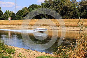 Motor speed boat river ijssell low water level Netherlands