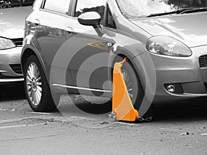 Motor traffic offence parking ticket clamp clamped warden fine law wheel