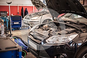 Motor vehicle checking and testing in service workshop