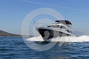 Motor-yacht cruising at full speed