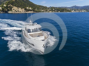 Motor yacht in navigation aerial view