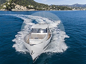 Motor yacht in navigation aerial view