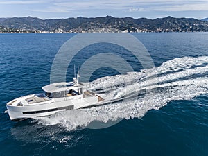 Motor yacht in navigation aerial view