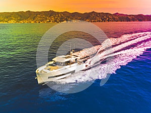 Motor yacht in navigation aerial view