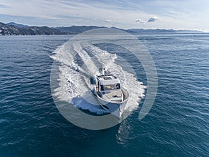 Motor yacht in navigation aerial view