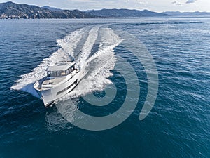 Motor yacht in navigation aerial view