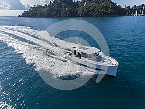 Motor yacht in navigation aerial view