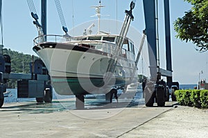 Motor yacht in sling