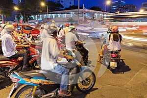 Motorbike drivers at the crossroad, Ho Chi Minh City