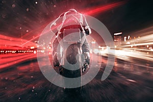 Motorbike drives through night city