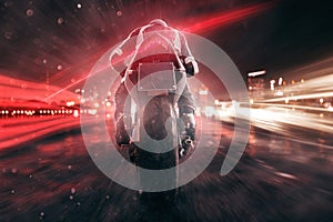 Motorbike drives through night city photo