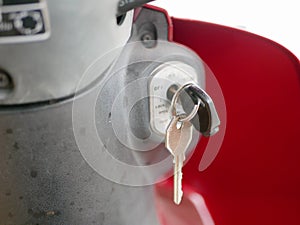 Motorbike key in its ignition keyhole