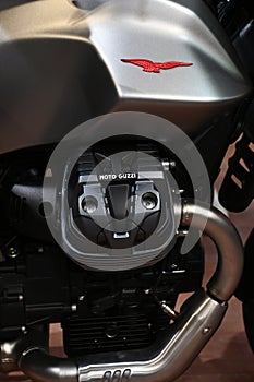 Motorbike with Moto Guzzi logo and engine closeup