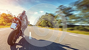 Motorbike on the road riding high speed. having fun riding the empty road on a motorcycle tour / journey