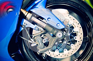 Motorbike wheel and disk brakes