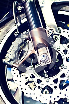 Motorbike wheel and disk brakes