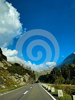 Motorbikers on the highway in Swiss Alps