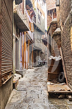 Motorbikes in a narrow alley in Srinagar