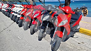 motorbikes scooter for rent beside sea for holidays and tourists