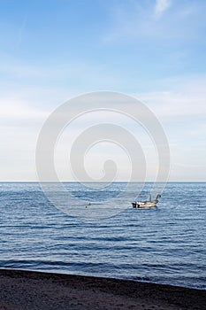 Motorboat in a bay in Petrovac