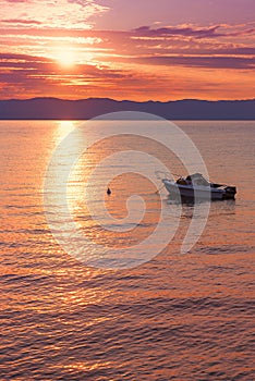 Motorboat at Kvarner Bucht, adriatic ocean at sunset