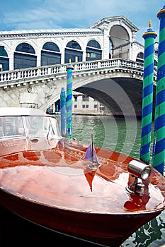 Motorboat and Rialto Bridge