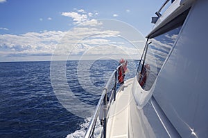 Motorboat side view with window ocean reflection