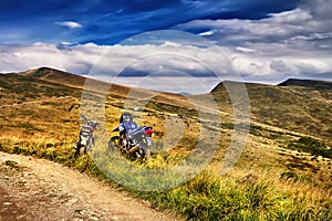 Motorcicle on beautiful mountain landscape background photo