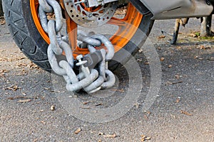 Motorcycle anti-theft chain with padlock security lock on rear w