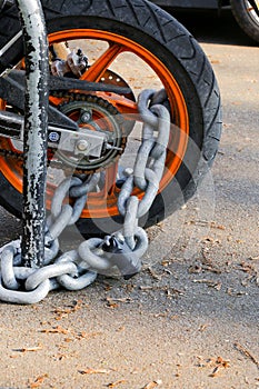 Motorcycle anti-theft chain with padlock security lock on rear w