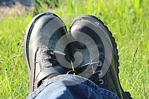 Motorcycle Boots - Biker Relaxing in the Grass