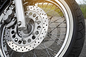 Motorcycle brake disc on a wheel close-up