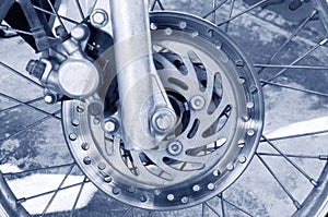Motorcycle brake disc on a wheel,Wheel and disc brakes, Part of the wheel