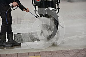 Motorcycle Car Wash Motorcycle Make more clean. A series of photos a biker washes his motorcycle at the car wash